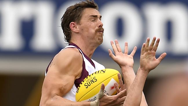 GOLD COAST, AUSTRALIA - FEBRUARY 27: Joe Daniher of the Lions takes a mark during the AFL Practice Match between the Gold Coast Suns and the Brisbane Lions at Metricon Stadium on February 27, 2021 in Gold Coast, Australia. (Photo by Albert Perez/Getty Images)