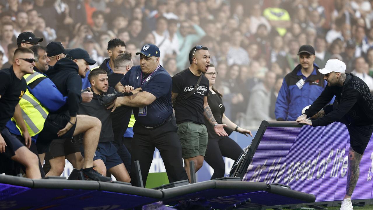 Victory fans stormed the pitch at AAMI Park last December. (Photo by Darrian Traynor/Getty Images)