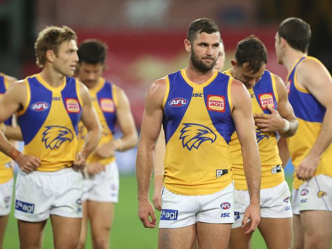 GOLD COAST, AUSTRALIA - SEPTEMBER 06: West Coast Eagles leave the field after losing the round 16 AFL match between the Western Bulldogs and the West Coast Eagles at Metricon Stadium on September 06, 2020 in Gold Coast, Australia. (Photo by Chris Hyde/Getty Images)