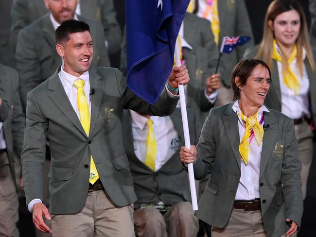 BIRMINGHAM, ENGLAND - JULY 28: Eddie Ockenden and Rachael Grinham, Flag Bearers of Team Australia lead their team out during the Opening Ceremony of the Birmingham 2022 Commonwealth Games at Alexander Stadium on July 28, 2022 on the Birmingham, England. (Photo by Alex Davidson/Getty Images)