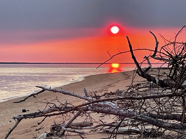 Sunset in a smoky haze at Channel Point. Picture: Malcolm Richardson