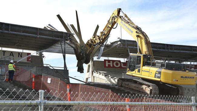 Demolition begins at Football Park, with the grandstand coming down. Picture: Sarah Reed