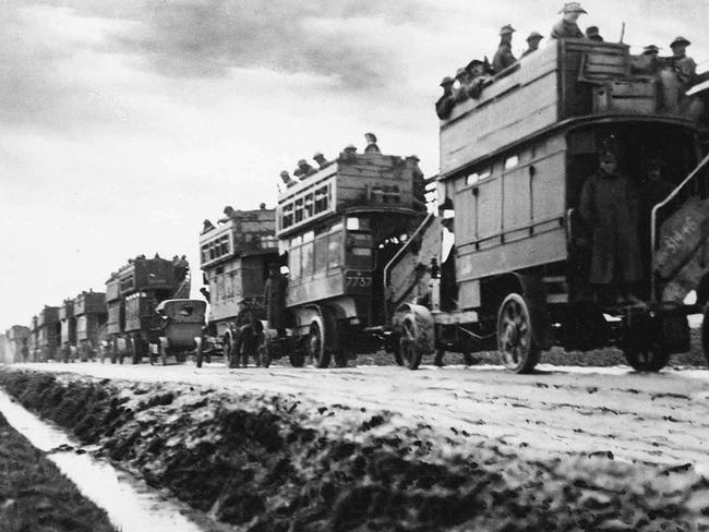 Double-decker buses ferry Australian troops to battloe in France in 1918.