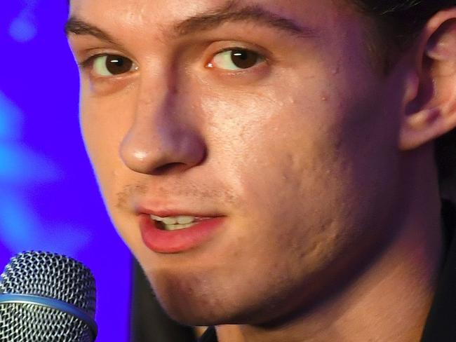 British actor Tom Holland poses for a photo during a press conference to promote his latest film "Spider-Man: Homecoming" in Seoul on July 3, 2017.  The movie will open in South Korea July 5. / AFP PHOTO / JUNG Yeon-Je