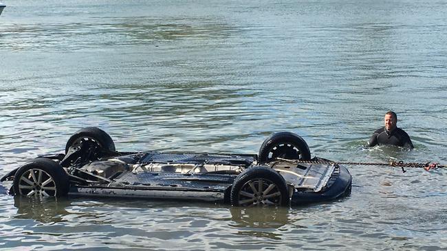 This car ended up in the water off Bayview boat ramp after a spider spooked its driver. Photo Stuart Cooper