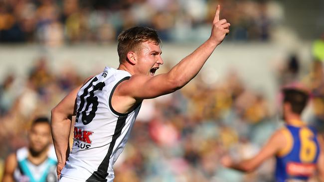 Ollie Wines celebrates a goal against the Eagles last season. Picture: Paul Kane/Getty Images