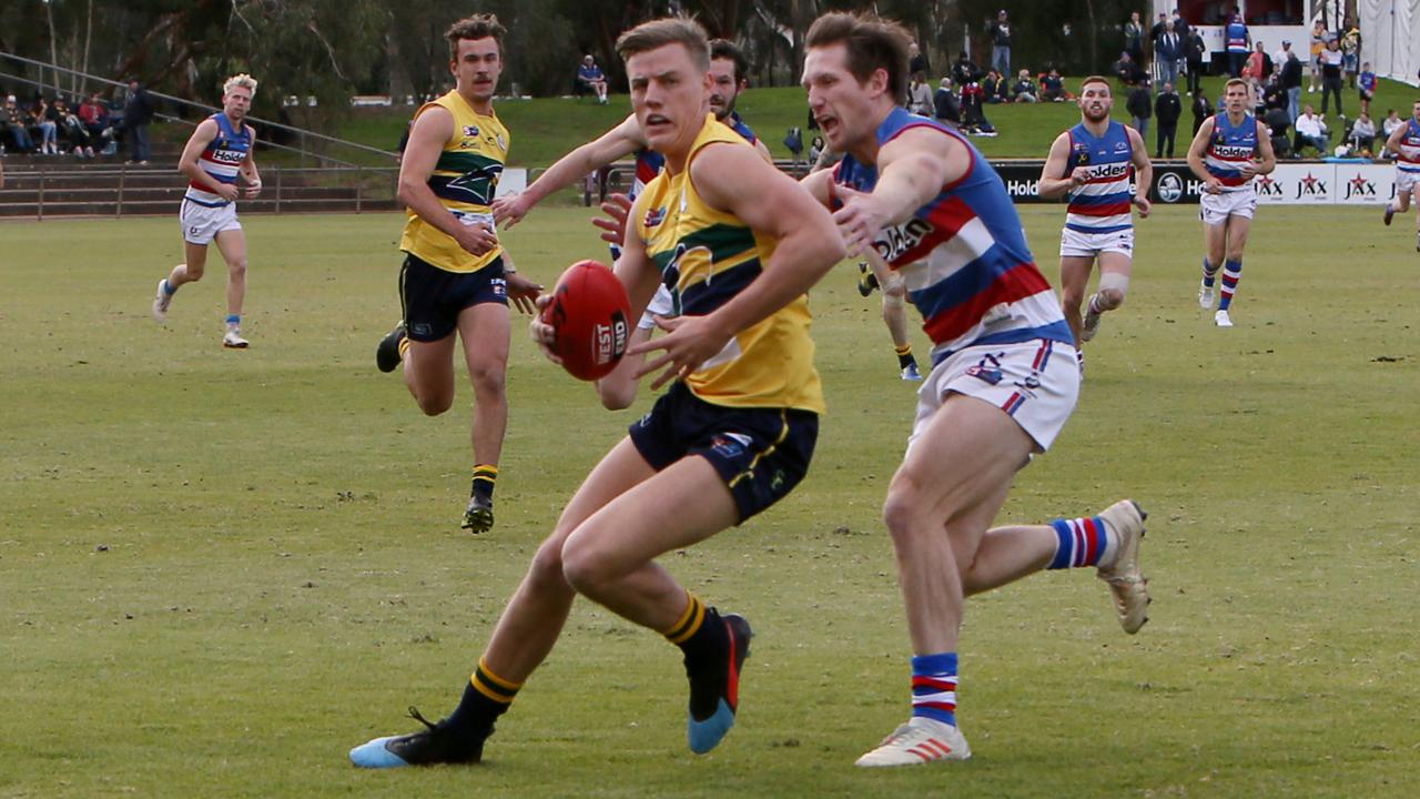 SANFL: Central District v Eagles at Elizabeth Oval. Eagles Player #7 Nicholas Hayes leaps for the ball. (AAP/Emma Brasier)