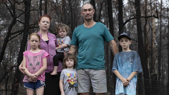 Lisa and Steve Fitzgerald with children Sienna, Arizzonah, Harper and Nick; and Andrew and Maryanne Nye. Picture: John Feder