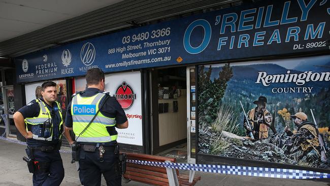 Police outside O'Reillys Firearms in Thornbury. Picture: Ian Currie