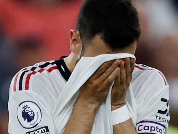 Manchester United's Portuguese midfielder Bruno Fernandes reacts at the end of the English Premier League football match between West Ham United and Manchester United at the London Stadium, in London on May 7, 2023. (Photo by Ian Kington / AFP) / RESTRICTED TO EDITORIAL USE. No use with unauthorized audio, video, data, fixture lists, club/league logos or 'live' services. Online in-match use limited to 120 images. An additional 40 images may be used in extra time. No video emulation. Social media in-match use limited to 120 images. An additional 40 images may be used in extra time. No use in betting publications, games or single club/league/player publications. /