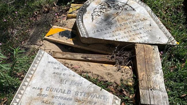 One of the stones 'laid down' in June 2019 remains broken on the ground at The Bight Cemetery. Picture: Janine Watson