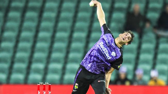 Peter Hatzoglou of the Hurricanes sends down a delivery. (Photo by Simon Sturzaker/Getty Images)