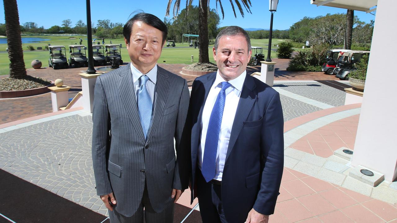 Golden Horse Nine Dragon Lake Holdings’ Feng Di pictured at Hope Island Resort at the Gold Coast with Consolidated Properties executive chair Don O’Rorke. Picture: Richard Gosling