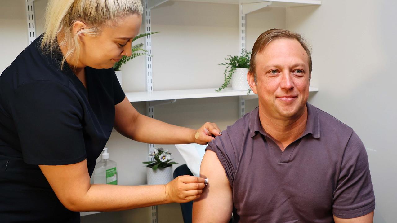 Premier Steven Miles receives a flu vaccination from nurse Elli-Mae Nash on Tuesday. Picture: Tertius Pickard/NCA NewsWire