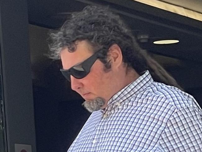 Gary David Cosgrove, 45, of Berkeley Vale, leaving Wyong Local Court after being convicted of leading police on a pursuit on a Harley Davidson motorbike with a pillion passenger who wasn't wearing a helmet. Picture: NewsLocal