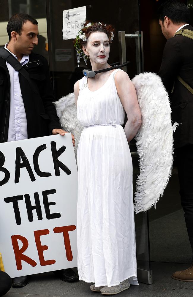 Climate angels stage protest outside AGL building Herald Sun