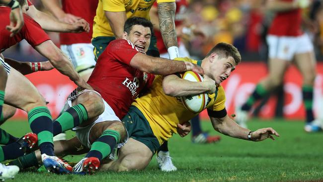 James OConnor goes in to score a try for Australia.