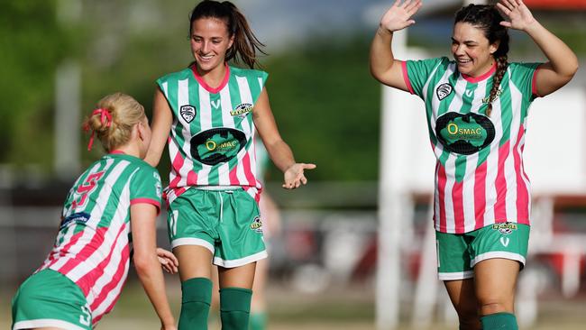 Townsville Warriors FC beat Estates FC 6-0 in round 3 of the Queensland Kappa Cup. Sophie Hannay and Maria Heinzen Pitt celebrate with Bianca Foster. Picture: Sharon Woodward.