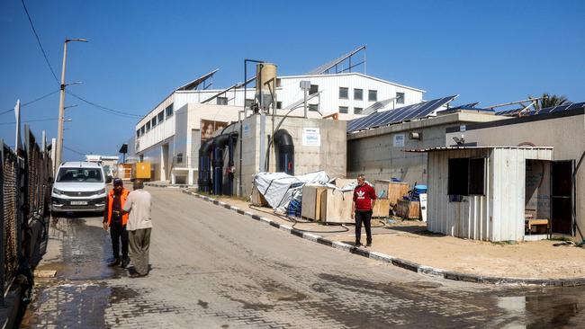 A man walks outside at the Southern Gaza Desalination plant, which stopped working earlier after Israel cut off electricity supply to the Gaza Strip. Picture: AFP