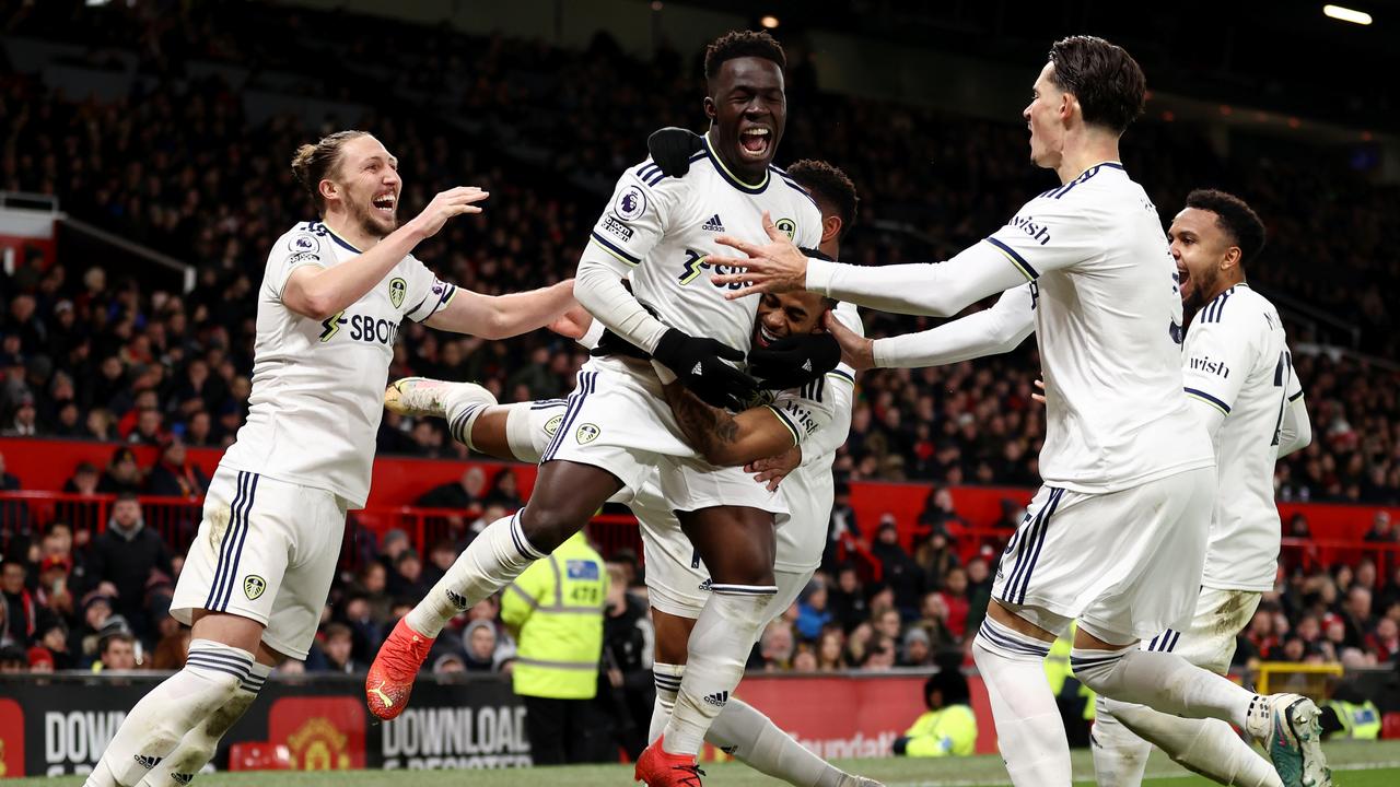 MANCHESTER, ENGLAND – FEBRUARY 08: Wilfried Gnonto of Leeds United celebrates with Crysencio Summerville after Raphael Varane of Manchester United concedes an own goal, the second goal for Leeds United, during the Premier League match between Manchester United and Leeds United at Old Trafford on February 08, 2023 in Manchester, England. (Photo by Naomi Baker/Getty Images)