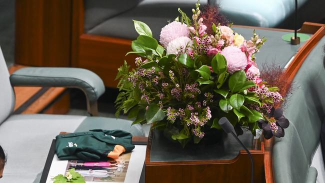 Flowers in Peta Murphy's seat in the House of Representatives at Parliament House in Canberra. Picture: NCA NewsWire/Martin Ollman