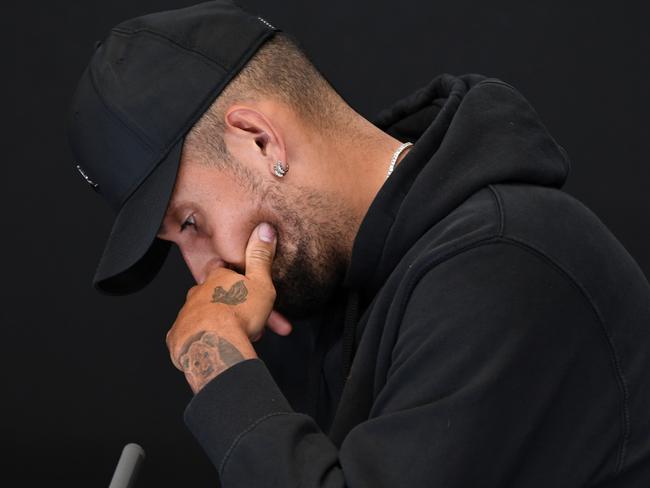 MELBOURNE, AUSTRALIA - JANUARY 16: Nick Kyrgios of Australia speaks to media to announce his withdrawal from the tournament due to a knee injury during day one of the 2023 Australian Open at Melbourne Park on January 16, 2023 in Melbourne, Australia. (Photo by James D. Morgan/Getty Images)