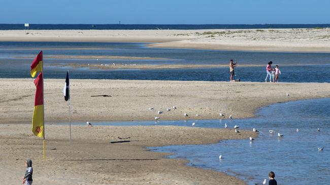 The sand spit at Happy Valley and Bulcock Beach.