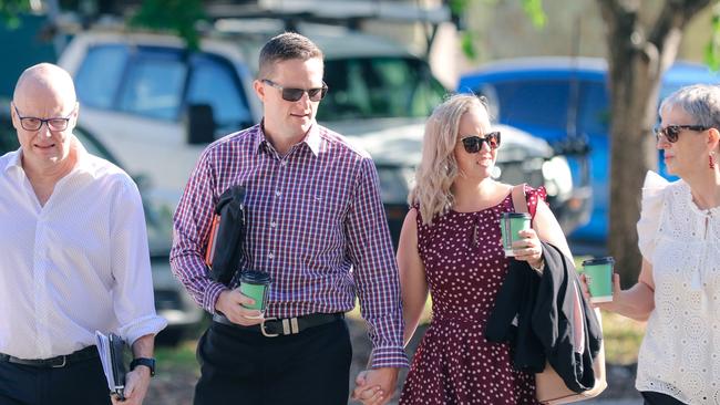 NT Police Officer Patrick Carson (2nd from L) allegedly raped a teenage woman seen arriving at the NT Supreme Court with supporters. Picture: Glenn Campbell