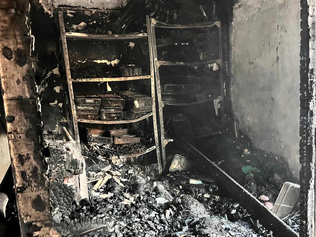 Burnt medical supplies are scattered in a storage room hit by an Israeli strike on the Kamal Adwan hospital.