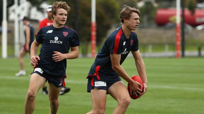 Aaron Nietschke, right, during his first pre-season at the Demons.