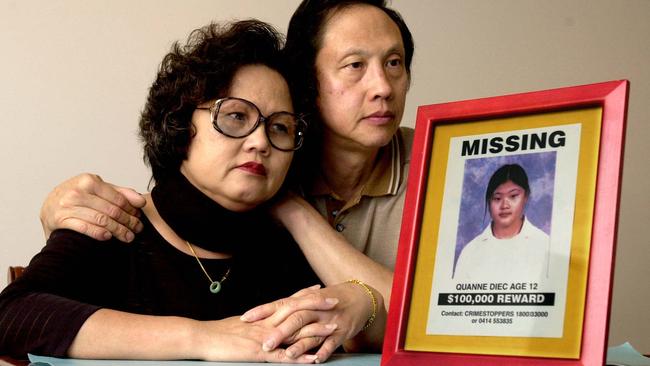 Parents Sam Diec and Muoi Ngo pictured with a photo of their missing daughter Quanne at their Granville home in 2003.