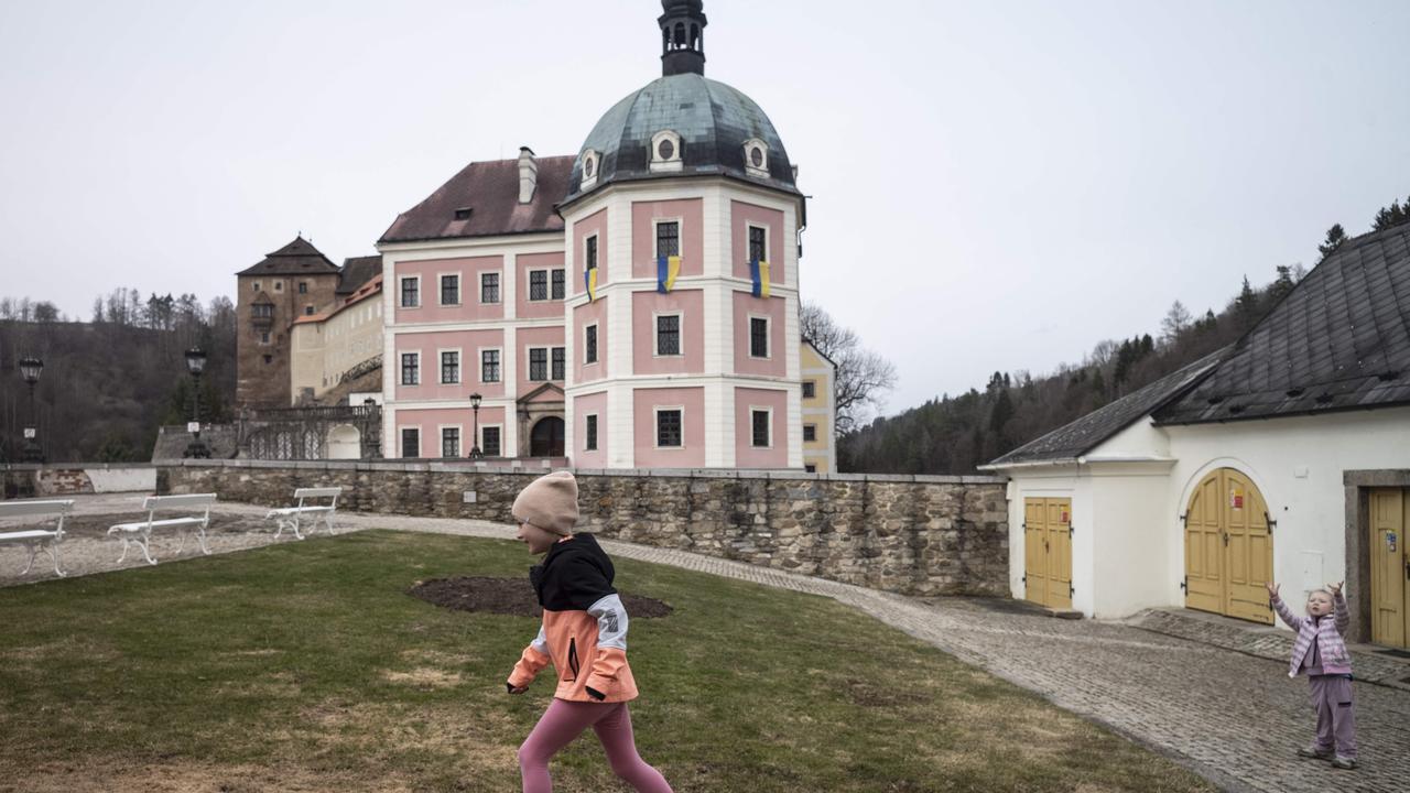 Ukrainian children play in the yard at the Becov nad Teplou castle. Picture: Michal Cizek/AFP