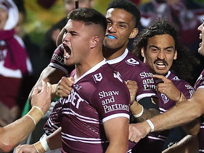 SYDNEY, AUSTRALIA - JUNE 04: Josh Schuster of the Sea Eagles celebrates scoring a try during the round 13 NRL match between the Manly Sea Eagles and the New Zealand Warriors at 4 Pines Park, on June 04, 2022, in Sydney, Australia. (Photo by Cameron Spencer/Getty Images)