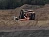 Mine investigating after digger rolls at open cut operation