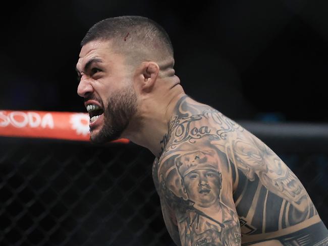 SYDNEY, AUSTRALIA - SEPTEMBER 10: Tyson Pedro of Australia   celebrates his win over Anton Turkalj of Sweden during the UFC 293 event  at Qudos Bank Arena on September 10, 2023 in Sydney, Australia. (Photo by Mark Evans/Getty Images)