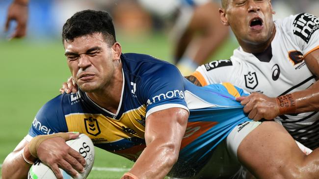 GOLD COAST, AUSTRALIA - MARCH 19: David Fifita of the Titans scores a try during the round two NRL match between the Gold Coast Titans and the Brisbane Broncos at Cbus Super Stadium on March 19, 2021, in Gold Coast, Australia. (Photo by Matt Roberts/Getty Images)