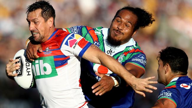 Mitchell Pearce makes a break to score a try for the Knights. Picture: Getty Images