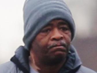 James Robertson, 56, of Detroit, walks to catch his morning bus as a part of his commute to work on Jan. 29, 2015. Hundreds of people have contributed tens of thousands of dollars to help Robertson, who says he typically walks 21 miles (34 kilometers) to get to and from work. Robertson began making the daily trek to the factory where he molds parts after his car stopped working ten years ago and bus service was cut back. He's had perfect attendance for more than 12 years. (AP Photo/Detroit Free Press, Ryan Garza) DETROIT NEWS OUT; NO SALES