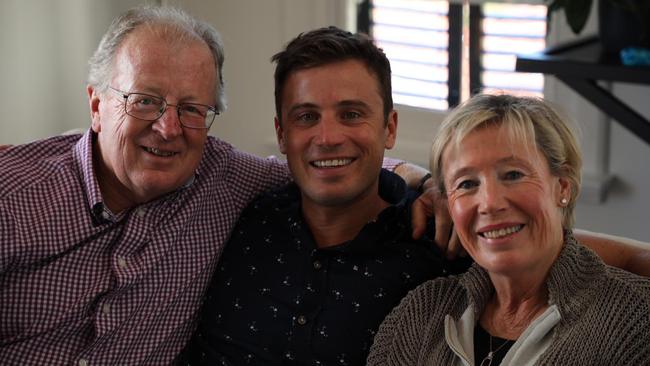 James Tobin with parents Tony and Christa.