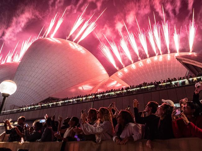 SYDNEY, AUSTRALIA - NewsWire Photos 31 DEC, 2022: People are seen celebrating on the crowded foreshore of Circular Quay in Sydney the New Year's Eve   Picture: NCA NewsWire / Flavio Brancaleone