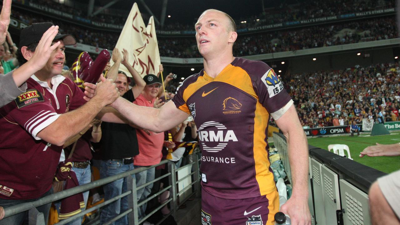 Darren Lockyer celebrates Brisbane’s win over the Dragons in 2011. Picture: Jono Searle