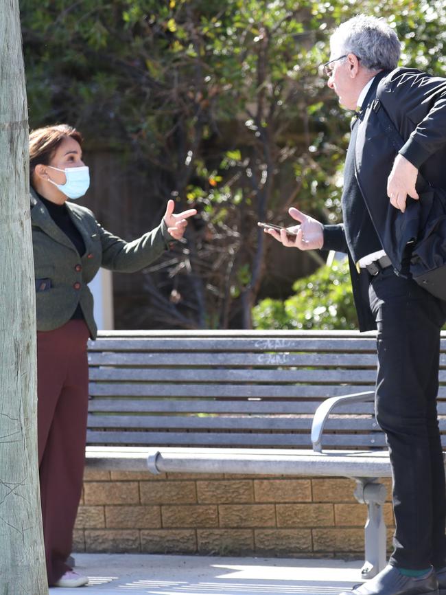 Daily Telegraph journalist Danielle Gusmaroli talks to Michael Podgoetsky as he waits for the bus. Picture: John Grainger