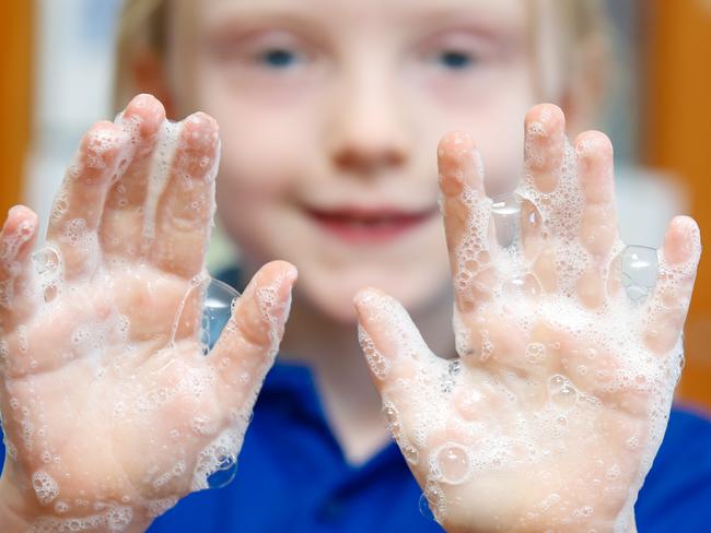 Stuart Park Primary student Abigail Samuels 7 washing hands to beat Corona Virus .Picture GLENN CAMPBELL