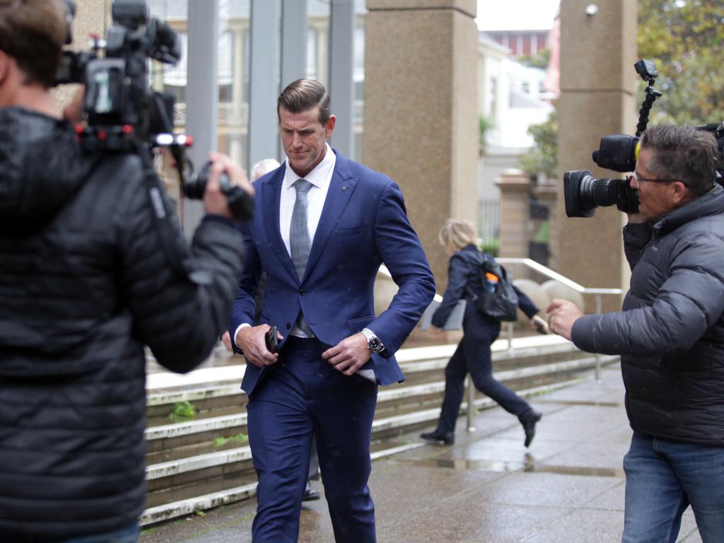 Ben Roberts-Smith leaves the Federal Court in Sydney on Thursday, surrounded by camera operators. Picture: Christian Gilles / NewsWire