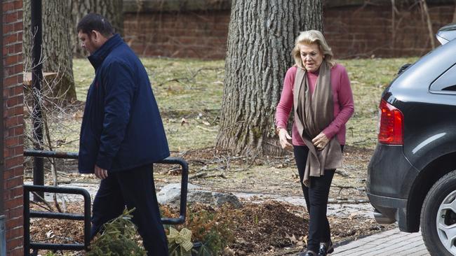 Mother and son head inside in Boston. Pictures: Angus Mordant