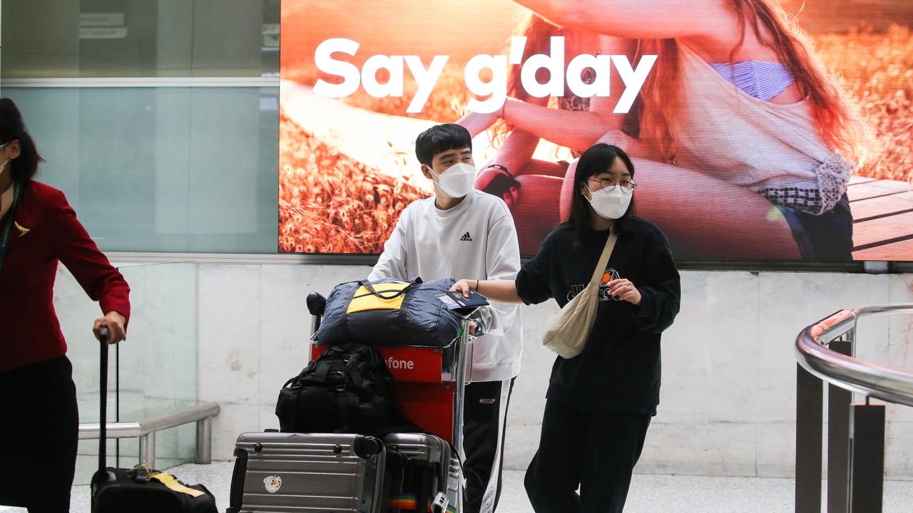 Arrivals at Sydney International Airport, off a Cathay Pacific flight from Hong Kong. Picture: NCA Newswire / Gaye Gerard