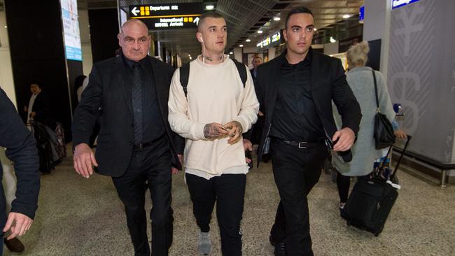 Dustin Martin arrives back in Australia from New Zealand after a late-season trip to talk to his father Shane about rival contract offers. Picture: Jay Town