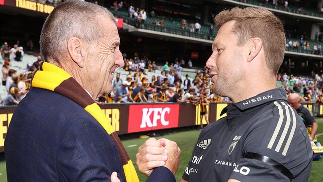 Full circle as Sam Mitchell, now senior coach of Hawthorn, shakes hands with Kennett after their round 1 win this year. Picture: Michael Klein