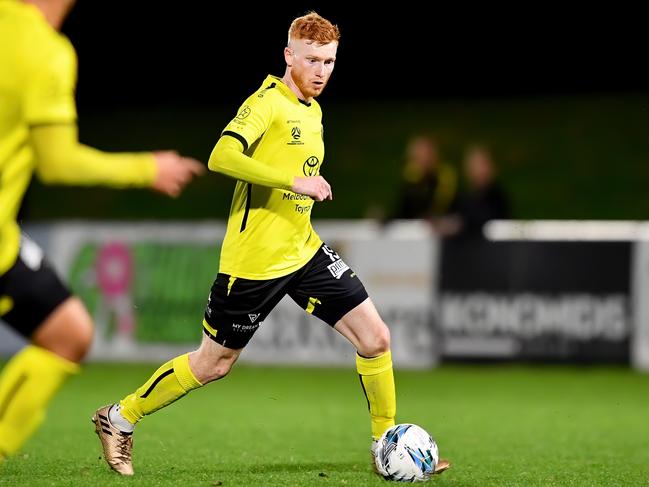 Sean Ellis of Heidelberg United runs with the ball during the round 10 NPL Victoria Men's match between Heidelberg United and North Geelong Warriors at Olympic Park in Heidelberg West, Victoria on April 21, 2023.