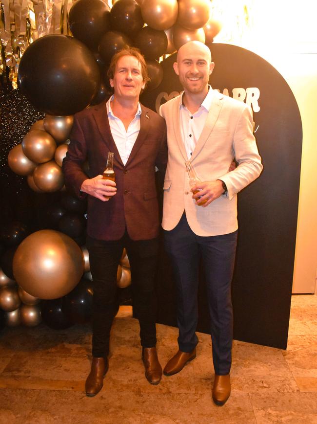 Matt Johnson and Keenan Hughes having a great night at the Cowwarr Saints Football &amp; Netball Club Golden Gala Ball 2024. Picture: Jack Colantuono